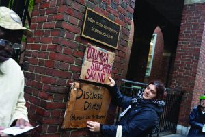 Students picket in front of New York University School of Law
