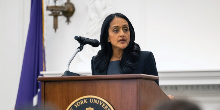 woman speaking at a podium