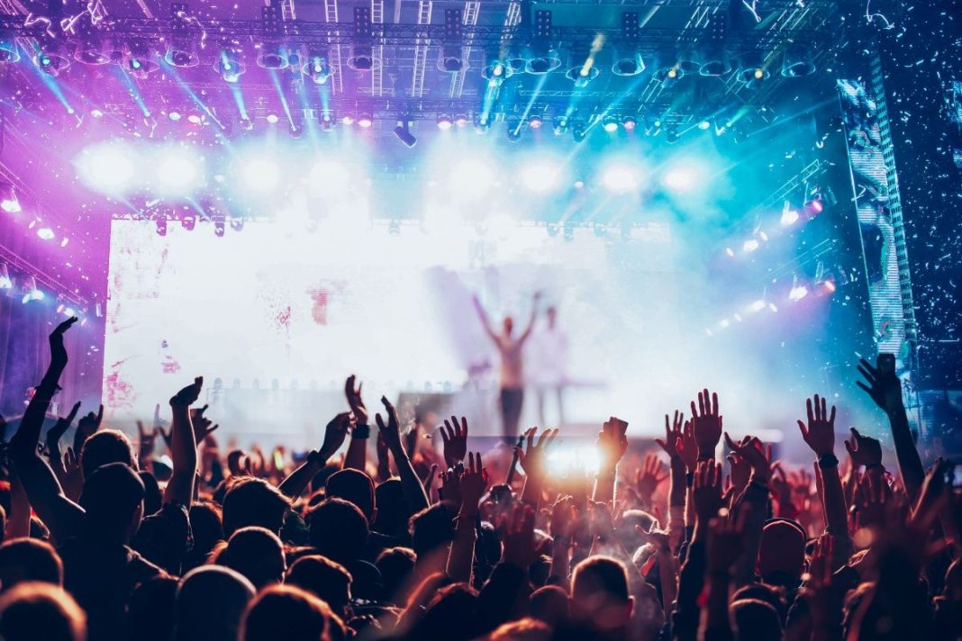 performer on stage in front of an audience