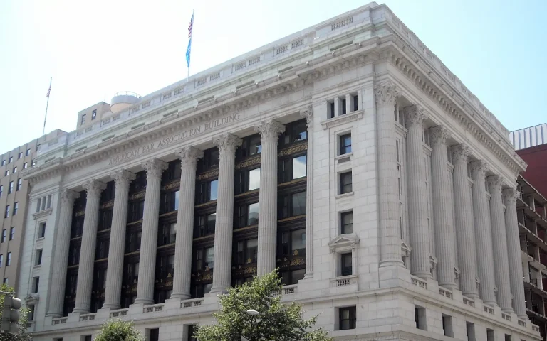 American Bar Association Building with tall classical columns and the inscription “American Bar Association Building” across the facade.