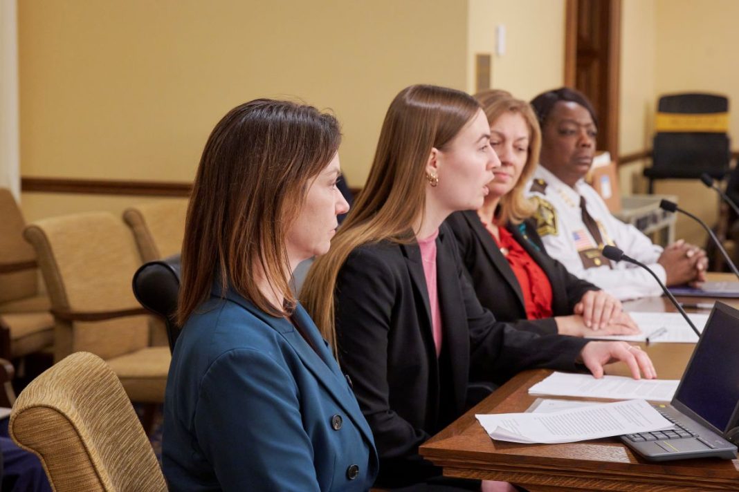 law students sitting a table during a mock trial