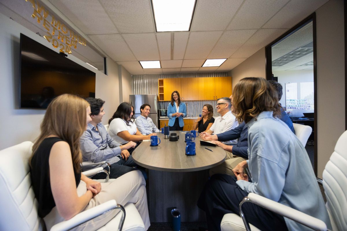legal team sitting around a conference table