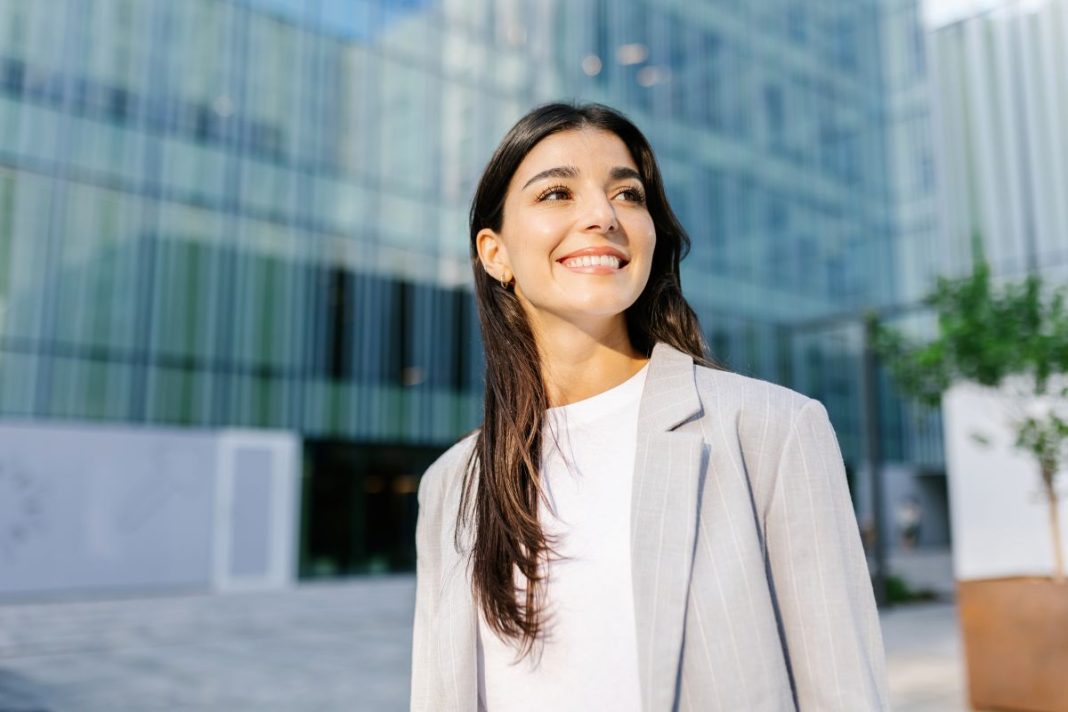 professional lady looking up smiling