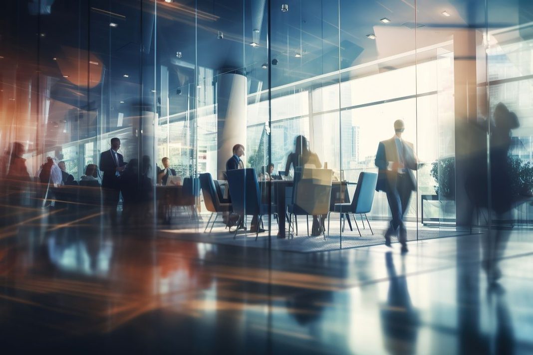 blurred photo of a people in a company boardroom